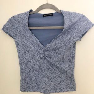 blue brandy melville gina top with white flowers